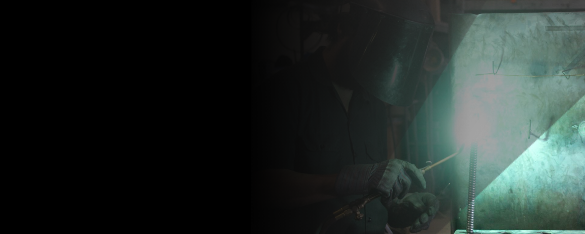 Technician welding sewer cable.